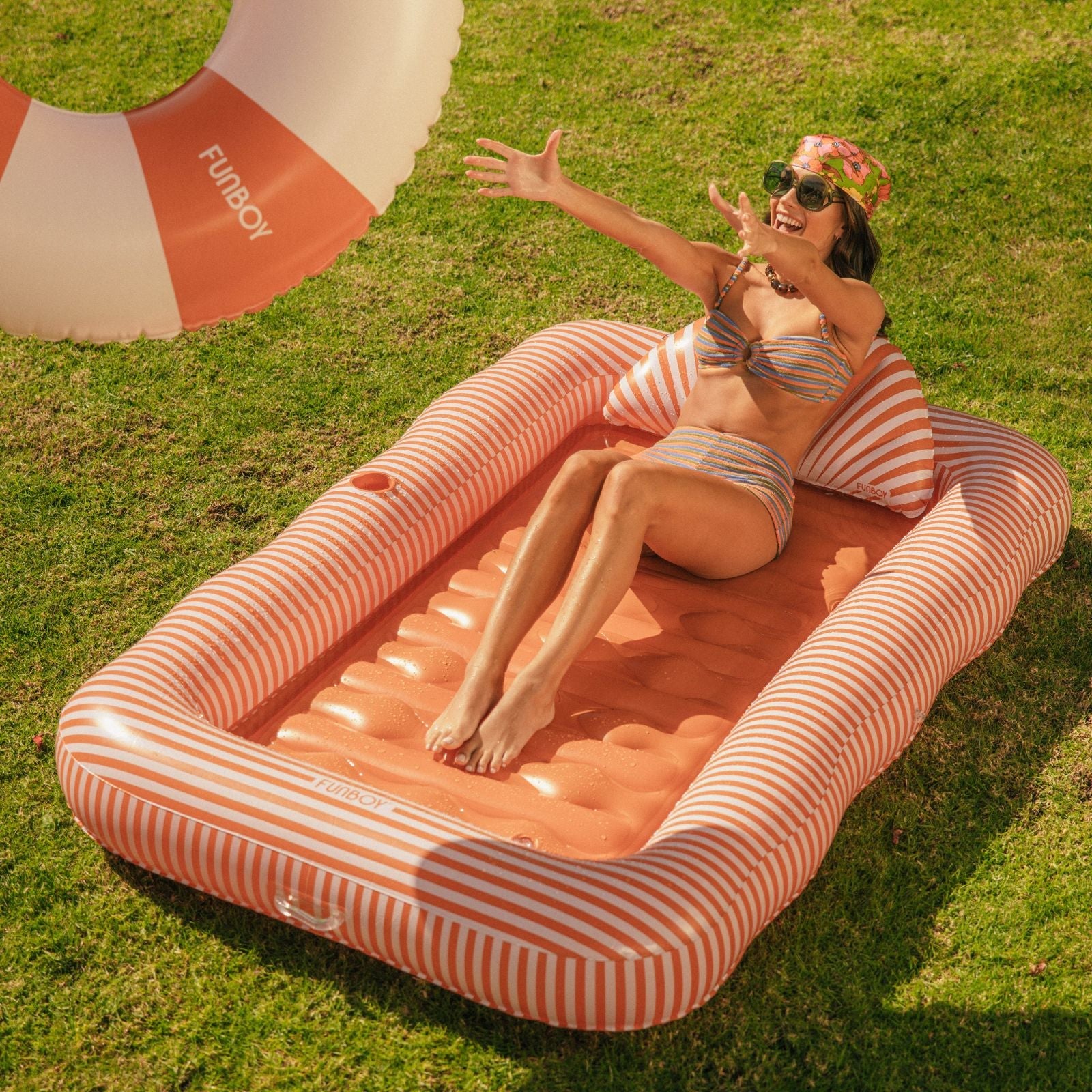 Burnt Orange Tanning Bundle; Tanning Pool Lounger + Tube | Funboy Near Me